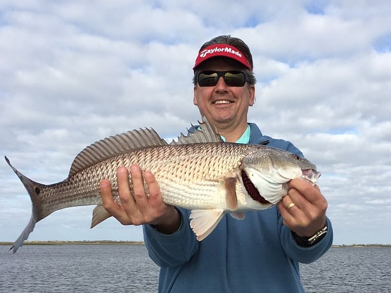 A Good Time Catching Redfish - New Orleans Fishing Charters